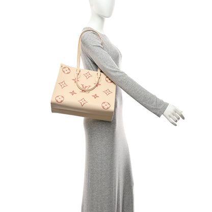 Empreinte Monogram Giant Onthego Mm Crem Handbag