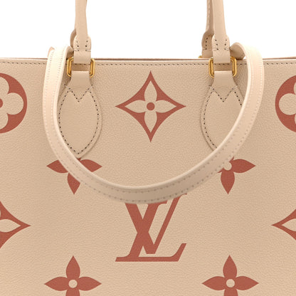 Empreinte Monogram Giant Onthego Mm Crem Handbag