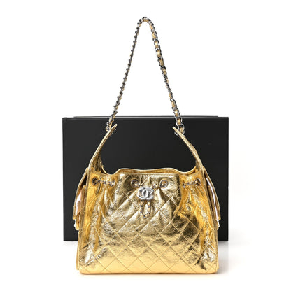 Small Quilted Calfskin Handbag - Gold