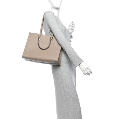 Empreinte Monogram Giant Onthego Mm Tour Handbag