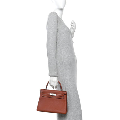 Togo Kelly Retourne 28 Sienne Handbag
