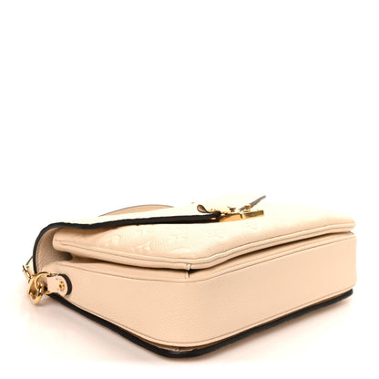 Empreinte Pochette Metis Creme Handbag