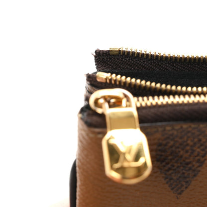 Reverse Monogram Giant Double Zip Pochet Handbag